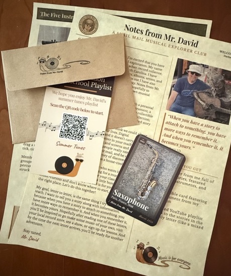 A letter, instrument card, and other contents from a Notes from Mr. David envelope